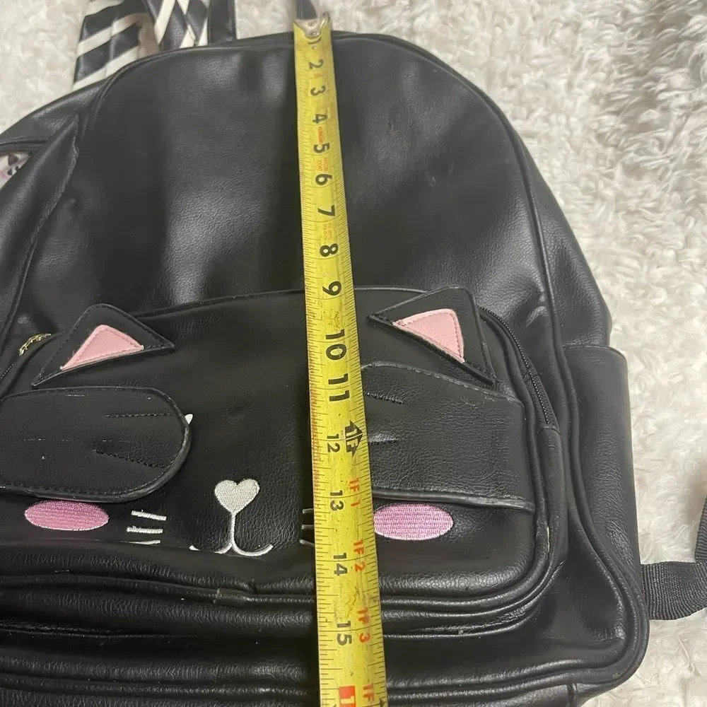 Betsey Johnson synthetic Black Cat Face pick a boo Medium Backpack.